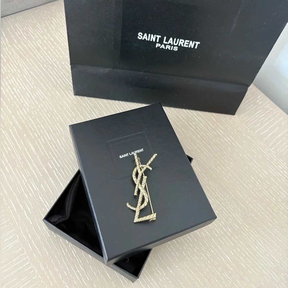 Saint Laurent Cassandre Brooch in Metal Gold Tone Wrapped Cord Texture YSL Logo - Picture 1 of 16